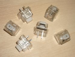 Matias switches; the quiet click switches have their original white sliders