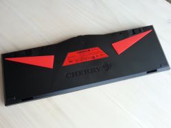 Backside of the keyboard with the extra rubber feet attached