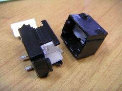 Opened, showing genuine switchplate