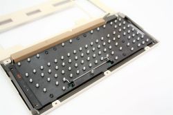 Keyboard mechanism with space bar hardware