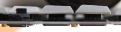 Side view of a mounting plate from a short-throw keyboard. Stabiliser bar mounts can be seen at the left.