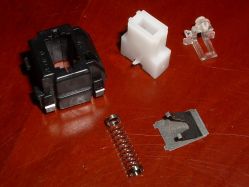 The components of the discrete switch assembly