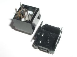 Base removed, revealing switch internals and bottom view of the slider