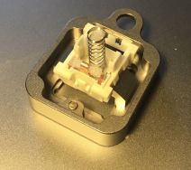 MX-style switch with coil and leaf spring floss mod