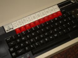 BBC Micro function keys f0–9 with function key legend strip