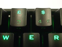 Unevenness of top, bottom and front legends on a Cherry MX–based keyboard