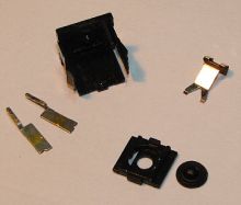 "Switchplate" disassembled, and terminals removed from the base