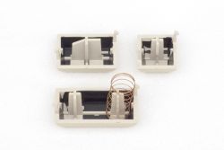 Keycap stems, including extra spring for SHIFT