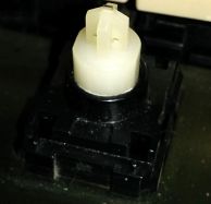1st Generation clicky switch; note the tiny metal tip at the top of the stem