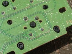 Cherry G80-3700 levelling mechanism mounted into PCB; one of the rear legs is not correctly inserted