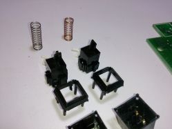 Disassembled, locking switch on left
