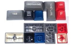 Various keycaps, showing the different printing methods