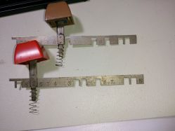 Encoder bars, springs, sliders and keycaps<ref name="HaaTa"/>