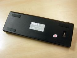 Bottom view, showing the bank of four DIP switches