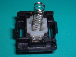 Upper shell with slider and springs fitted