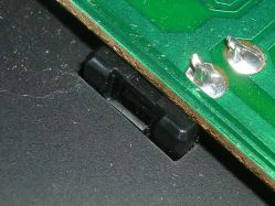 Snapped retention clip from a damaged switch
