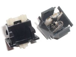 Opened; the switchplate guide ridge remains, even though the switchplate no longer reaches down to it