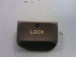 Lock keycap with an embedded red LED.