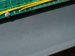 Hand-engraved writing on the underside of the top panel
