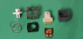 A fully disassembled switch save for the slider peg which cannot be removed non-destructively