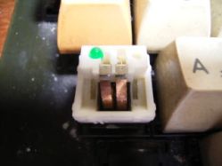 Vertical reed switch with LED variant slider.<ref name="n860_9201"/>