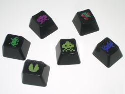 Assorted keycaps lit by camera flash