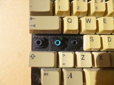 The Caps Lock key switch (blue slider) is different from the others (black slider) to provide room for its indicator LED.