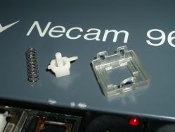 Slider, spring, upper shell
