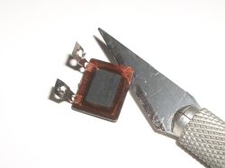 The seal can be eased off safely with a sharp knife