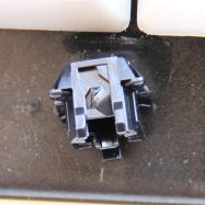 Ramp for the click arm at the rear of the slider