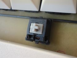 Cherry MX Linear Grey under space bar. Note the lighter colour and diode