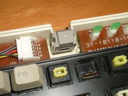 Unused jack viewed from inside, alongside the connector for the AT cable