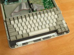 Disassembled to show keyboard assembly