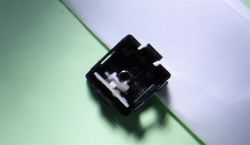 Bottom part of the case, with spring, lever and contacts
