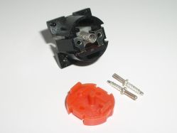 The base plug is retained by the legs