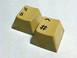 Two caps before being Retr0brighted.