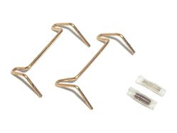 Contact assembly parts; the rubber tube has been cut open to reveal the spring