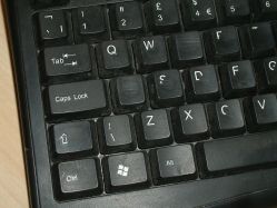 Heavy wear on this generic membrane keyboard has led to significant loss of the selective-coated legends