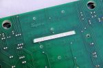 PCB, bottom view with label and branding