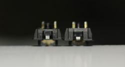 MX Black (Left) / Olympia Linear Clear (Right) switches bottom housings compared