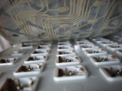 Undersides revealing the "click" switch over membrane. You can see there is a difference in the colour for the leaf springs being used as compared to Type I.