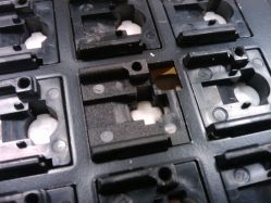 3rd Generation switch underside, separate housing and plate construction, linear slider.