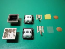 3rd Generation switches dismantled, linear (top) vs. clicky (bottom).<ref name="clicky3rd" />