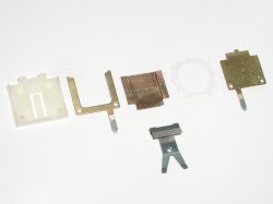 Full disassembly: bottom view of parts (front to rear)