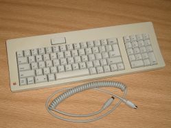 Full keyboard with detachable, coiled cable