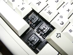Switch detail showing MX black switch with diodes, and PCB with black solder resistance