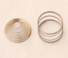 Springs from a switch (left) and spacebar (right). The switching spring plays an essential role in switch actuation.