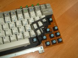 Foam layer between the keycaps and PCB