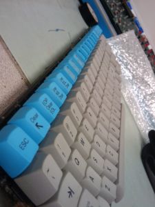 Clean keycaps, top row uses heavy switches, approximately 130 g.