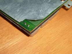 Insulating layer between the shield plate and PCB
